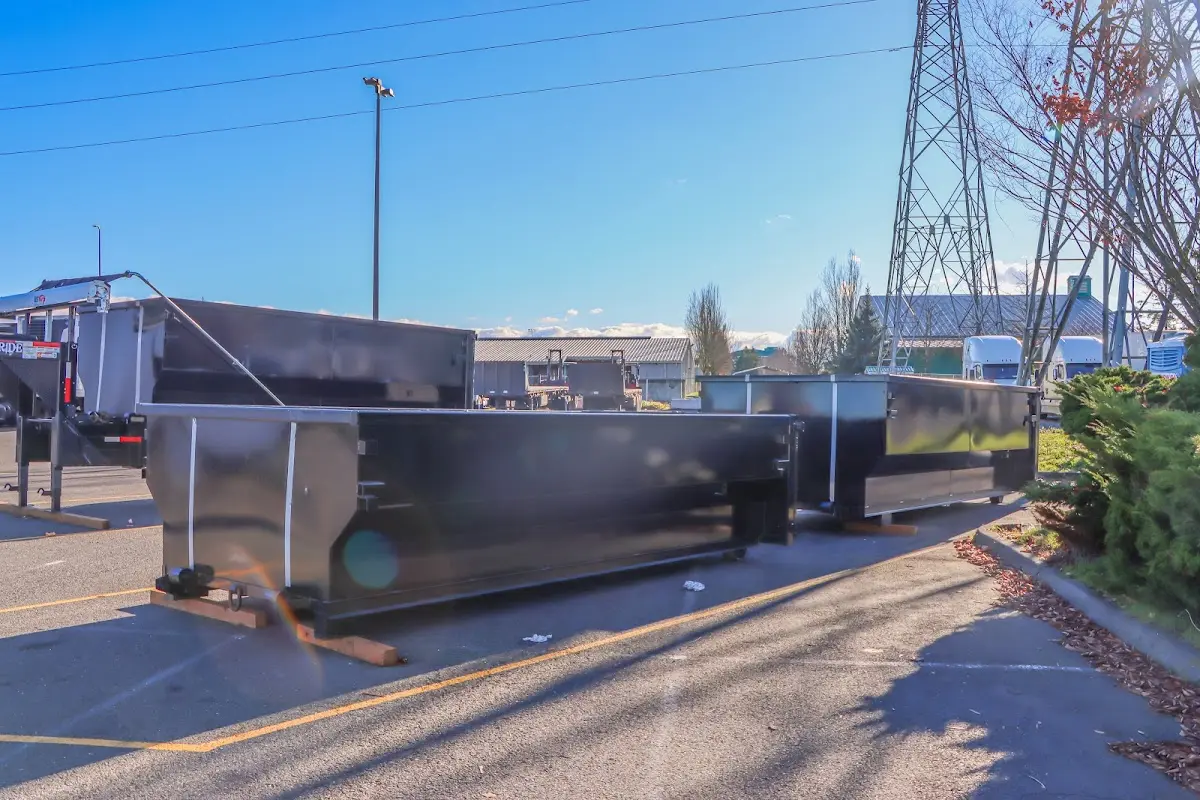 Roll-off dumpster ready for waste disposal at job site for Concrete Dumpster Rental in Los Alamos